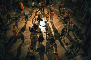 People dancing together in a group.